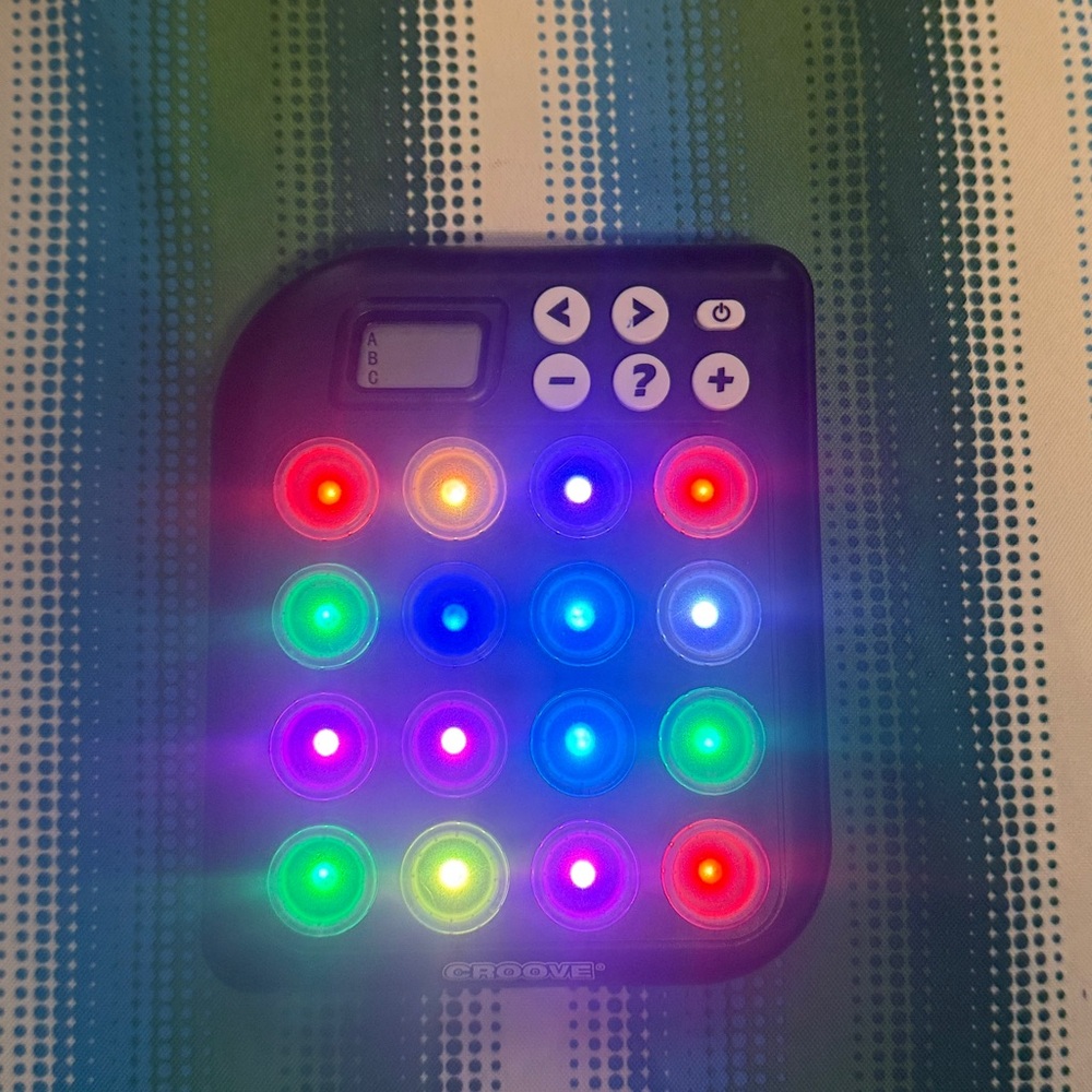 Croove Black Button Game.